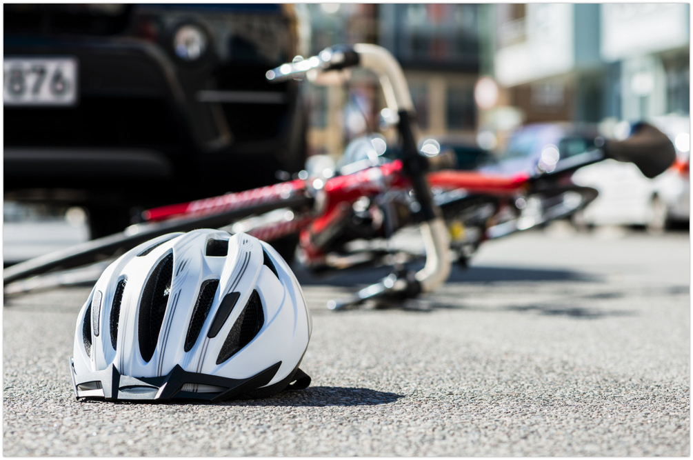 bike and helmet lying on the ground